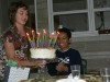 Kara bringing a birthday cake